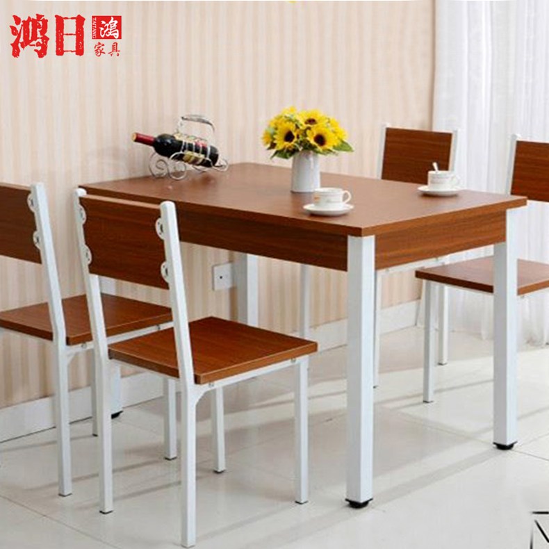 Square dining tables are used in home dining rooms