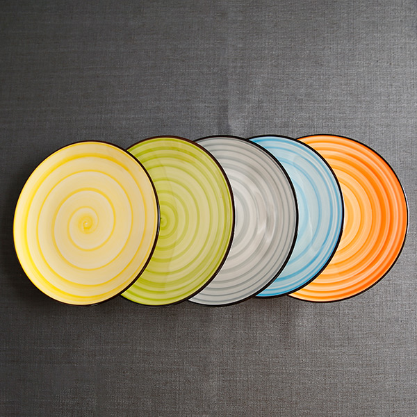 Colorful ceramic disc with black edge