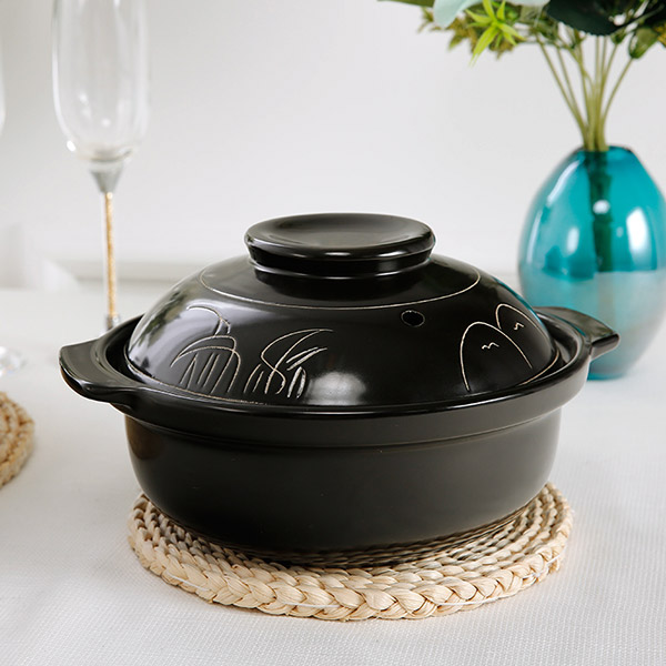 Black carved casserole